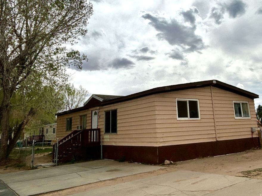 Spacious Double-Wide family home with fully fenced back and front yard. New roof installed in 2023. Washer and Dryer included. Future residents will need to submit an application to East Meadows. Lot rent is $480 monthly; covers water, sewer and trash.