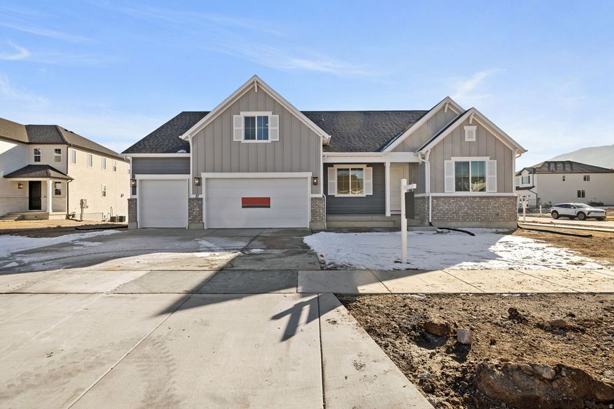 **CONTRACT ON THIS HOME TODAY AND QUALIFY FOR RATES AS LOW AS 3.999%*** Restrictions Apply: Contact Us for More Information**** / WATERFRONT COMMUNITY!!! Minutes away from shopping, schools, trails, and parks. This community is a secluded oasis tucked away just south of Talons Cove Golf Course, nestled up against Utah Lake. The beautiful Hemingway is our top-selling floor plan for a good reason! This home has a large living room, massive gourmet kitchen, making entertaining a breeze! Upstairs there are 4 bedrooms and a generous loft. The primary bedroom has dual sinks and a large walk-in shower. This home has a 3-car garage for all of your toys, and an unfinished 9ft basement with a wet bar pre-plumb for room to grow and entertain. Contact us today for more information or to schedule a community tour!