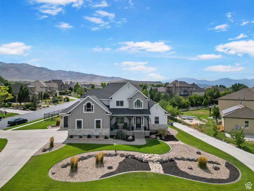 "Your dream home is here! Nestled on a spacious .49 acre lot in a sought-after neighborhood, this unique property features a huge RV pad, two full kitchens perfect for entertaining, and exclusive access to amazing amenities - including two clubhouses with gyms, a private marina, and a year-round hot springs pool. Luxury, space, and lifestyle all in one.  Play a round of golf or use the private ramp to launch your boat on Utah Lake all in the same day! Park your toys in the spacious 3-car garage. The fully fenced backyard with large deck and primary suite on the main level makes this the perfect home! Reach out to schedule a private showing!