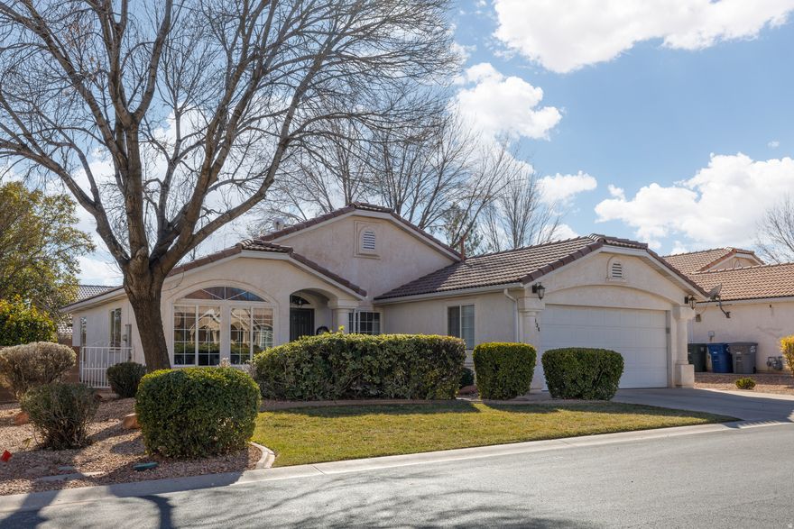 This updated home blends modern finishes with abundant storage & a private outdoor retreat, all in a lifestyle-friendly community. Boasting a fresh interior: LVP flooring throughout, new stainless-steel appliances, new disposal, updated light fixtures, fresh paint, & new carpet. All windows have new screens. Large front windows showcase amazing views of Ivins ''red mountain'' from the heart of the home. Cabinets throughout & large closets for superb organization. Garage adds more storage plus a finished epoxy floor. Thoughtful updates create a clean, low-maintenance living space you can enjoy from day one. You'll love the backyard living with a covered extended patio for year-round outdoor gatherings, finished with easy-care landscaping including a new drip irrigation system & garden boxes. Fully fenced & very private. HOA amenities include a community park with a playground & a pavilion with basketball courts. Front landscaping is taken care of weekly by the HOA, making maintenance a breeze. No rentals allowed in this neighborhood.