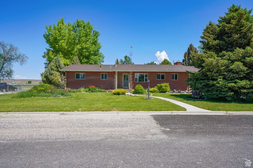 Let this superb unique home become your hideaway! The secluded back yard will become your must needed sanctuary! It is a place that you will be able to plant and play in the dirt and make your heart happy!  The location is a 10 with all of the Valley's Major Medical Offices including the Hospital within 2 Blocks!  Home is full brick with tons of storage. Beautiful new flooring through consisting of tasteful laminate and thick plush carpet in bedrooms. Sellers loss is buyers gain!