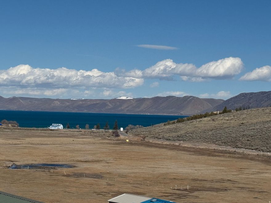 Come bring your RV and enjoy Bear Lake!! Larger RV LOT in Sweetwater Trailer Park with full hookups (water,power,sewer)--Amenities include pool, several picnic areas, two playgrounds, sand VB pit, basketball court and overflow parking.  Public beach close by which can be accessed on a UTV/ATV/walking trail from the upper RV area. Pickleville Playhouse also close by as well as a 4 mile paved walking path and Hodges Canyon Trailhead for access into The Sinks/Cache National Forest. There are two older RV's on the property that are included if Buyer wants them and also a shed.