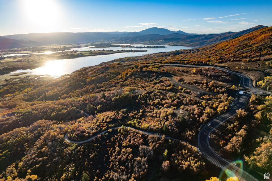 Discover the potential of Osprey Ranch Lot 26, a breathtaking 6.67-acre property that seamlessly blends natural beauty with endless possibilities. Surrounded by mature trees, sagebrush, and scrub oaks, this picturesque lot offers stunning views of Pineview Reservoir and the surrounding mountains-an ideal backdrop for your dream home. Situated within a sprawling 600-acre mountain community, Osprey Ranch offers unparalleled access to year-round outdoor recreation. Adjacent to 10,000 acres of national forest, adventure is always within reach. Perched on the hillside above Pineview Lake's northwestern shore, this exclusive community features just 67 thoughtfully designed ranch lots, each promising a lifetime of outdoor enjoyment. Every lot comes fully improved with essential utilities, including water, sewer, and power/gas stubs, ensuring a smooth transition to mountain living. Residents will also enjoy well-maintained common areas, scenic trails, and peaceful ponds throughout the community. Explore the possibilities at Osprey Ranch Lot 26 and make your mountain retreat a reality. All property details, boundaries, and documents should be verified through buyer's due diligence.