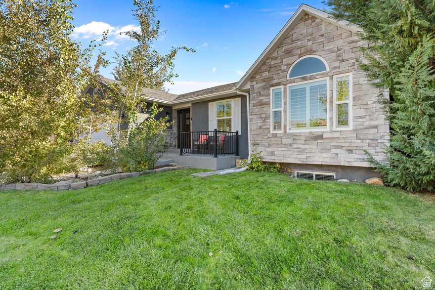 Updated rambler in east Layton with stunning mountain views and no backyard neighbors. Enjoy the views on your new deck (2024). Home features carpet installed 4 years ago with brand-new basement carpet, kitchen remodel (2018) with updated flooring (2017), and bathroom remodel (2020). All upstairs windows replaced in 2022. Roof is 8 years old. New furnace and A/C installed in 2023. Exterior redone in 2020 with new shutters (3 years old), front door (2 years old), and added front patio with poured concrete. Fully fenced yard with deck and patio perfect for entertaining.