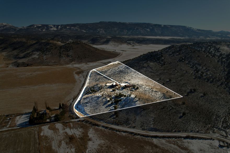 Nestled in the quiet, rural community of Fremont, Utah-known for its small population and wide-open spaces-this 2,788 sq ft home sits on an impressive 13.22 acres with sweeping mountain and valley views. The property offers a rare blend of privacy, land, and functionality, featuring a large garage with dedicated RV parking and plenty of room for equipment, toys, or a workshop. With expansive acreage and stunning scenery in every direction, this property is ideal for anyone seeking space, serenity, and the beauty of Utah's high country.