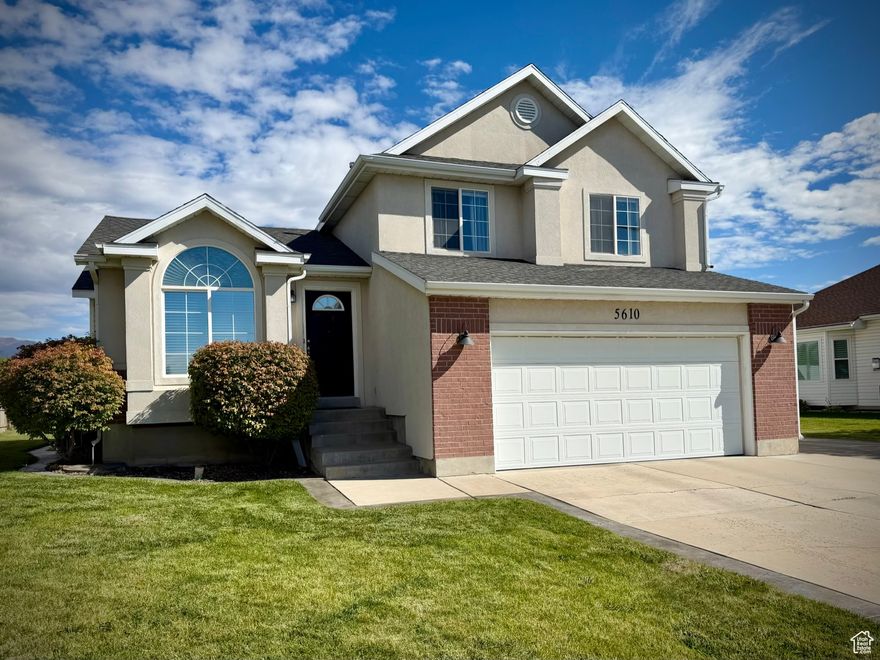 Beautifully kept home in quiet Roy area. Fresh paint, cozy family room with fireplace. Recently replaced water heater, air conditioner, dishwasher, water softener, carpet, master bath vanity, garage door opener & springs.  Garage has a slatwall storage system. House has a 240V NEMA 14-50 outlet next to the RV pad for an RV hookup or charging electric vehicles. Backyard peach tree produces a lot of fruit. No backyard neighbors. Natural gas barbeque. Fiber internet installed. Down the street from large park with paved walking path, playground, and pickleball courts.