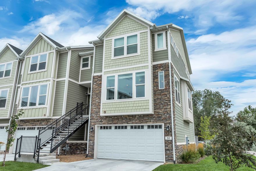 Step into this beautifully maintained end-unit townhome in Draper's highly sought-after Creekside community, where natural light, thoughtful upgrades, and an ideal layout come together effortlessly. Located in a top-rated school district, with shopping, dining, and quick access to Bangerter Highway and I-15, the location truly checks every box. The main level welcomes you with a bright, open living space and large windows that bring in an abundance of natural light. The kitchen is both functional and elevated, featuring upgraded cabinetry, thick quartz countertops, a large single-basin sink, and stainless steel appliances. It's designed for both everyday living and entertaining. Just off the kitchen, step out onto the deck and enjoy the bonus of a creek view. Upstairs, the primary suite offers a peaceful retreat with a spacious bathroom and a walk-in closet. You'll also find a conveniently located laundry room and a second bedroom with its own ensuite bath, creating an ideal setup for guests or additional privacy. The lower level adds even more flexibility with a third bedroom, full bathroom, and direct walkout access to a private, fenced back patio. A generous two-car garage with additional storage space completes the home. Townhomes in this community don't come up often, especially with this combination of row-end natural light, privacy, and thoughtful upgrades. This one won't last long!