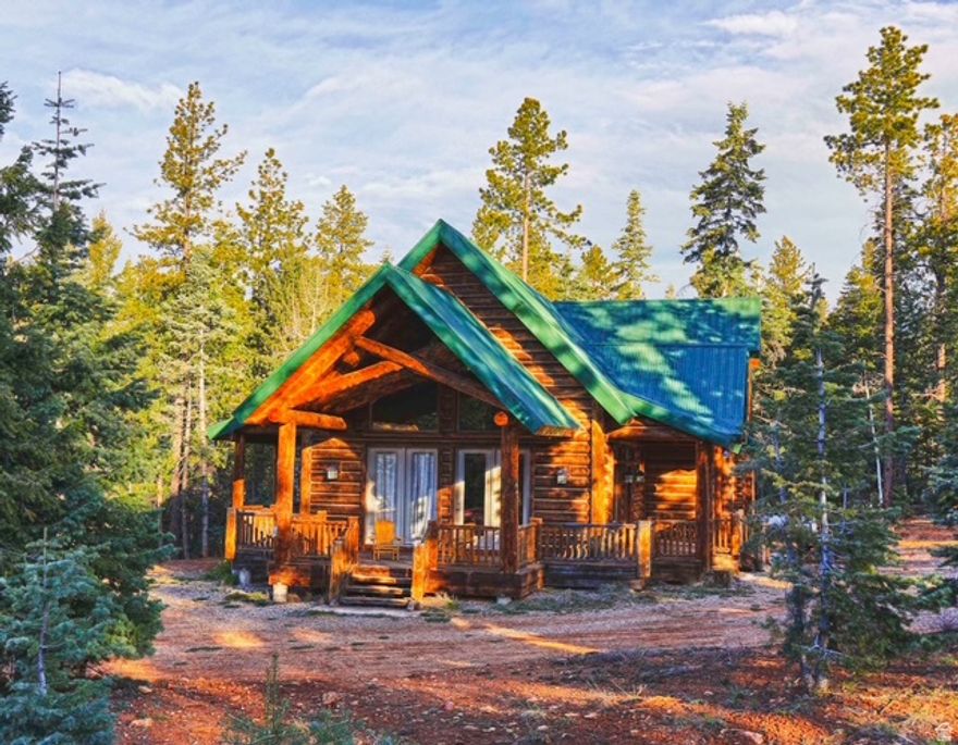 The sale includes 1391 E. Mossberg Rd. (.57 acres, cabin) and 1387 E. Mossberg Rd. (.86 acres adjacent lot). The information in the listing report includes both lots.  The HOA fee is $220 per lot, so a total $440 per year.  The taxes stated include both lots. Rare acreage in this desirable Duck Creek Village. The cabin is meticulously constructed and maintained. Square footage figures are provided as a courtesy estimate only; Buyer is advised to obtain an independent measurement.