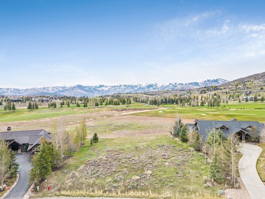 Spectacular ski mountain views from this flat Glenwild lot!  Arguably one of the finest homesites in Glenwild, this exceptional .60-acre lot offers the rare combination of breathtaking mountain and ski area views, effortless buildability, and premier location within Park City's most established gated golf community. Flat topography and ideal proportions make the parcel highly conducive to a custom, single level or multi story home. Coveted south-facing exposure provides abundant natural light and passive winter warmth-one of Park City's most desirable orientations. Ideally positioned for easy access in and out of the community and just moments from the clubhouse, this homesite offers convenience without compromise. Whether seeking a summer mountain escape from the desert heat or a year-round luxury retreat centered around Utah's top-ranked golf experience, this is a rare opportunity to build an extraordinary home in one of Park City's most prestigious communities.