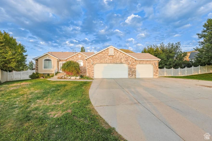 Come and experience the serene living this exceptional home with a gorgeous view has to offer. Located in a quiet cul-de-sac right off Skyline Drive, this home sits on .43 acres of fully fenced and landscaped land. This layout offers 2 SEPERATE living  spaces. Live in the upstairs and rent out the downstairs for additional income!!! Upstairs includes an updated white kitchen with silestone counters, vaulted ceilings, gas stove, stone sink, a breakfast bar with seating for 5, silent closing drawers, glass display cupboards, LED under cabinet lighting, a built in desk, and as many cabinets as you'll ever need! It overlooks the large family room with access to your backyard oasis complete with concrete patio, landscape boulders, shade trees, an area for a large garden, seperate basement entrance, double gates, and access from the backyard to pull in and store your off road toys or add a greenhouse. RV parking and circle parking ensure many people can occupy this space comfortably. The large master suite has attached master bathroom with garden tub/separate shower as well as a 10'x20' deck with beautiful mountain, valley, and lake views! The basement is an on-suite apartment with 2nd kitchen, dining room, 2 bedrooms, bathroom, and separate laundry. There is also a huge storage room that can be finished into an additional living room.  Water softener plus 2 furnaces to heat/cool separate levels of the home! 40 year roof was installed at the end of 2018. Square footage figures are provided as a courtesy estimate only. Buyer is advised to obtain an independent measurement