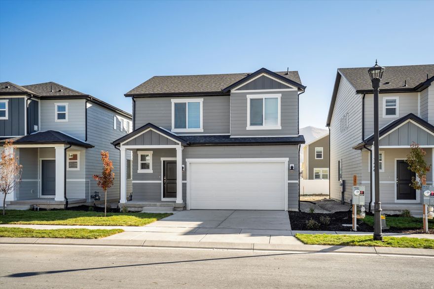 This home boasts open-concept living with a dining and great room connected to the kitchen. Upstairs, enjoy the primary suite and a walk-in closet. Unfinished basement included in home. Move in ready with a washer, dryer, fridge and blinds throughout! Total home approx. sq. ft. 2,585.
