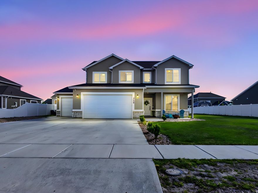 Built in 2023, this two-story home sits on a finished street in a newer Farr West community where surrounding construction is complete and landscaping is already in place-no waiting on the neighborhood to catch up. The main level includes a dedicated office or flex space with glass french doors, half bath, and a mudroom just off the oversized 4-car garage. The kitchen is equipped with a gas range, soft close cabinets, a large breakfast island, and opens to the living area with a gas fireplace, sliding glass doors to the backyard, creating a practical layout for both everyday living and hosting. Upstairs, the primary suite includes a walk-in closet and ensuite bath, along with a second family room that provides separation from the main living space. Three additional bedrooms, a full bathroom, laundry room and closet space complete the upper level. Set on a 0.27-acre lot, the yard is fully irrigated with partial fencing already in place. The garage stands out with extra height and depth, plus a wide driveway and side space suitable for RV or trailer parking. Fiber optic wiring is already installed for high-speed connectivity, plus a dedicated interior switch that powers an exterior roofline outlet, ideal for seasonal or permanent lighting. Positioned with clear views of Ben Lomond Peak and convenient access to 2700 North, commuting is straightforward with a direct route to Hill Air Force Base and the retail expansion nearby, including the new Target development just across the interstate. Move in and take advantage of the space, views, and convenience already in place.  *Square footage figures are provided as a courtesy estimate only and were obtained from county records. Buyer is advised to obtain an independent measurement. Buyer and Buyer's representative should do their own due diligence, all information is provided as a courtesy and to the best of knowledge of the selling brokerage. Selling brokerage shall not be held liable.