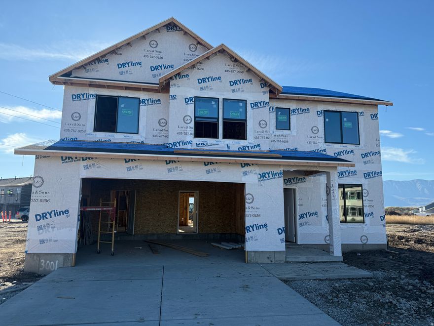 Under construction and finishing at the start of December. Get into a brand-new home for the holidays with $10,000 towards your closing costs! This beautiful home has all the bells and whistles. A tasteful exterior, XL kitchen, bonus/office, 4 spacious bedrooms, and an owner's suite that will blow your mind! Nibley City is building a park just feet away and you'll never get sick of the mountain views. There is still time to make selections on the inside if you act fast! We have a similar completed model you can walk through. Call today!