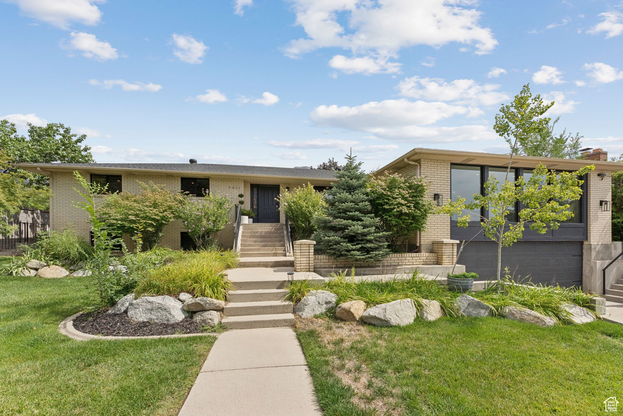 Completely renovated and ready to impress, this home in one of Cottonwood Heights' most desirable neighborhoods offers the perfect blend of style, comfort, and location. Recent updates include a new roof, kitchen, bathrooms, flooring, and windows, creating a fresh, modern feel throughout. The bright, open layout is complemented by luxury extras like a private gym and sauna, rare finds that elevate everyday living. A full mother-in-law apartment with its own entrance adds flexibility, whether for rental income, extended family, or guests. Tucked away on a peaceful street, you're just minutes from Big and Little Cottonwood Canyons with world-class skiing, hiking, and biking right at your doorstep-plus quick access to downtown Salt Lake City. Stylish, move-in ready, and built for both lifestyle and versatility-this is Cottonwood Heights living at its finest. Willing to include furniture in basement with the right offer.
