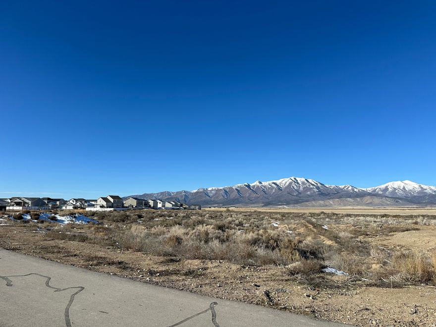 Deer Haven is a special area of large custom lots from 1 acres to 10 acres, located in The Ranches area of Eagle Mountain. Rarely do landowners, real estate developers, neighbors, special interest groups, and government officials collaborate together to create a community as special and unique as this one. Not only is this small yet distinctive community at the crossroads of a major deer migration corridor, it also provides refuge and feeding grounds for pronghorn and native bird populations (including quail, pheasant, and stunningly beautiful raptors), as well as many other smaller, furry, or flying friends! A conservation easement has been put in place to protect these animals and their habitats, affording you the uncommon opportunity to live peacefully among them; preserving their way of life while enjoying a front row seat to observe, commune, and bask in the beauties of nature. Bring your own builder. Other lots are available. Contact agent for more information. Owner/Broker.