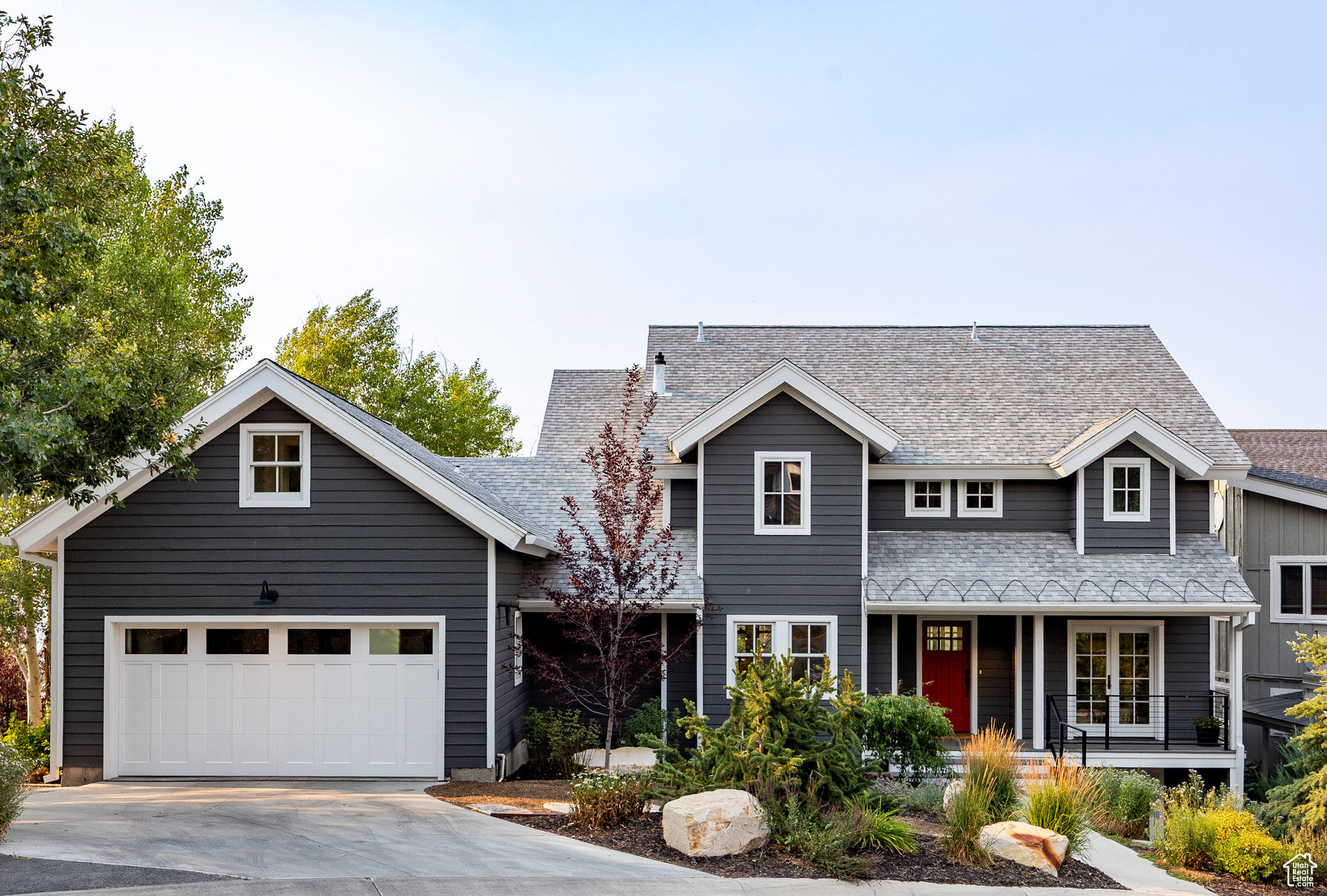 Welcome to 347 McHenry Avenue, a rare Old Town gem that combines privacy, space, and modern comfort with the soul and character that make Park City homes so special. Tucked into a quiet cul-de-sac on five Old Town lots, this 4,461 sq. ft. residence offers a peaceful retreat just steps from Main Street and moments from Deer Valley and Park City Mountain Resort. The home's heated driveway and walkway, flat approach, and two-car epoxy garage with built-in storage and workspace ensure ease and convenience year-round. Freshly painted exterior and updated landscaping create a welcoming first impression, while the wraparound deck-with sweeping views of Old Town and the ski resort-sets the stage for mountain living at its finest. Enjoy evenings by the wood-burning fireplace or soak in the hot tub as you watch the lights of the resort sparkle against the valley backdrop. Inside, you'll find five bedrooms and 5.5 baths, including a private lockout suite above the garage with its own entrance and bathroom-perfect for guests or flexible use. The warm, inviting interior blends modern upgrades with timeless charm. Multiple gathering spaces, an in-home gym and cycling room, motorized shades, and upgraded storage make the home as functional as it is beautiful. Upstairs bedrooms feature brand-new mini split A/C units for year-round comfort. McHenry Avenue offers what few Old Town locations can: privacy, quiet, and space-all within a short stroll down the stairs to Main Street. Adjacent to a pocket park and surrounded by panoramic views of the valley, ski slopes, and historic Old Town, this property provides a serene mountain lifestyle without sacrificing access to world-class dining, shopping, and skiing. If you've dreamed of a home that captures the best of Park City-character, convenience, and seclusion-347 McHenry Avenue delivers it all. This is more than a home; it's your private mountain retreat in the heart of Old Town.