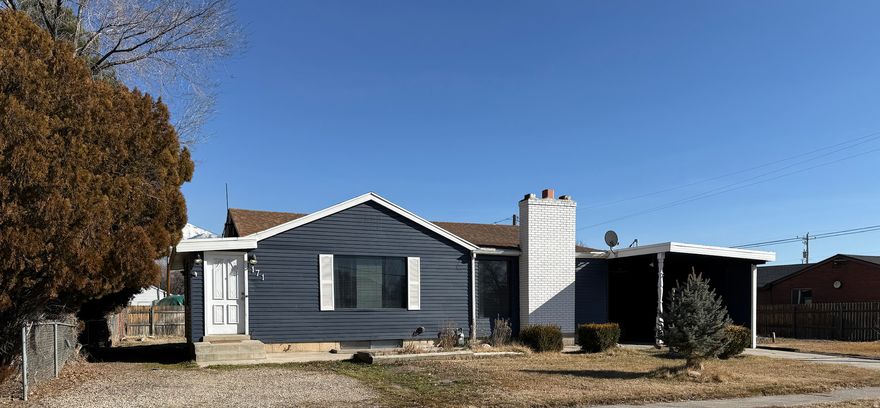 Charming 3-bedroom home ideally located in the heart of American Fork with quick access to I-15 for an easy commute. This home includes a mother-in-law apartment, perfect for extended family or a strong rental opportunity. Inside, enjoy cozy winter gatherings around the kitchen fireplace, along with thoughtful storage features including a large built-in spice cabinet and oversized walk-in pantry-ideal for cooking, gardening, or creative projects. Major system upgrades provide peace of mind, including a 200-amp electrical panel, whole-home surge protector, new grounding (Oct 2023), and a new water heater (Mar 2023). Radiant heat keeps the home comfortable, while keeping allergies away.  Step outside to a spacious, well-loved yard featuring 11 fruit trees, grape and fruit vines, an herb garden, patio, greenhouse, and large shed. A 6-zone programmable irrigation system keeps everything thriving through the summer months. The generous lot offers ample space for entertaining, gardening, or simply enjoying the outdoors. Additional highlights include two stoves, one refrigerator, and new front and back doors (2018). Conveniently located near shopping, dining, entertainment, and everyday amenities. A wonderful opportunity to add your personal touch and make this home your own-schedule your private showing today.