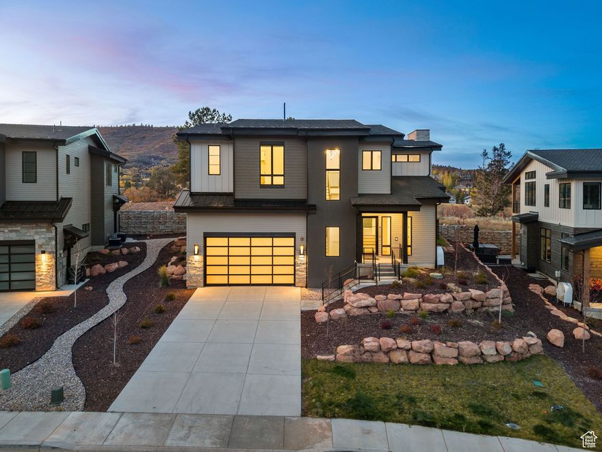 Year Long Tenants just moved in - Please do not disturb the tenants! Imagine living in Discovery Ridge almost halfway between Salt Lake City and Park City in a luxury mountain modern home. Only about 15 minutes to drive to downtown SLC and PC in both directions. This home is close to the freeway for an easy commute to work or a short 30-minute drive to the brand-new SLC International airport. This beautiful home has 360-degree views of Summit Park mountain bike and hiking trails, Summit County Open Space hiking and biking trails (literally out of your front door!), Woodward Resort, and Jeremy Ranch Country Club golf holes. Located in one of the best school districts in the state, this 3 bedroom (plus 1 flex room), 3.5 bathroom home is huge! And it is priced to move. It is 4,714 SF total. The home boasts 3,600 SF of amazing family space, a large primary suite with its own private patio and 2 other large ensuite bedrooms upstairs, with one smaller flex office/bedroom space on the main level. It has a massive oversized garage that can fit two full-size trucks, tons of toys, and is almost 25ft tall. But this home also has so much room to grow into it. At this $/SF, you could come in and finish the 1,124 SF basement and the 300 SF garage storage room and have instant value and equity growth in the property to sell it for a profit or create two additional bedrooms and an extra downstairs living room. The builder of this home and development is ready and willing to provide quotes and build out the basement and garage storage room. The main level is the crown jewel of the entire house. The upgraded Sub-Zero appliance package, endless custom cabinets, and a massive, oversized chef's kitchen will make dining and entertaining a delight. The open-concept dining and living room area flows and spills out into a large, covered deck patio for your hot tub and BBQ enjoyment.