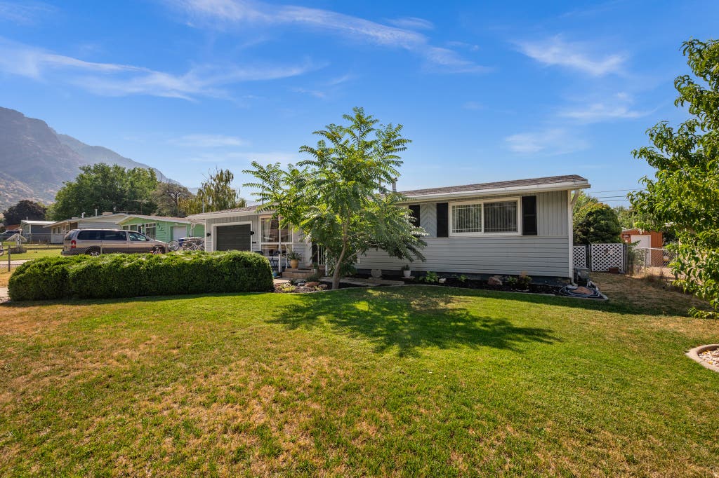 Photo of 909 RANCHO BLVD, Ogden, UT 84404 (MLS # 2177043)