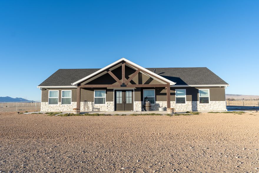 Come check out this beautifully built home located on the peaceful outskirts of Centerfield. Sitting on 4.33 acres, this property offers the perfect blend of privacy and convenience while still being close to everything the valley has to offer.The home features three spacious bedrooms, two finished bathrooms, and a two-car garage. The primary suite includes a private ensuite bathroom with a separate shower, a freestanding soaking tub, and a large walk-in closet with custom built-in shelving. In addition to the home's comfort and style, the property includes four shares of Gunnison irrigation water, as well as a private drilled well with one acre-foot of underground water-providing excellent water all year long! (especially during more dry water years). Enjoy breathtaking mountain views and peaceful country living year-round in this exceptional property!!