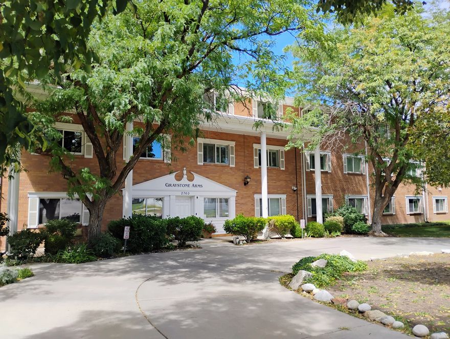 This spacious 3-bedroom 2-bath condo is located right between the heart of Sugar House & Mill Creek, and just minutes from I-80! Located in Graystone Arms on the main level of a secure building, it offers a convenient worry free lifestyle.  With an elevator to the security controlled garage and storage unit. This large corner unit has granite counter tops that run up to the cherry-wood cabinets & a cherry-wood Murphy bed is included in the 3rd bedroom. Ceiling & floor crown molding throughout this one level condo. Not to mention a large laundry room and double pain windows for super quiet city living.  You must do a walk through in person to see if this is your forever home?