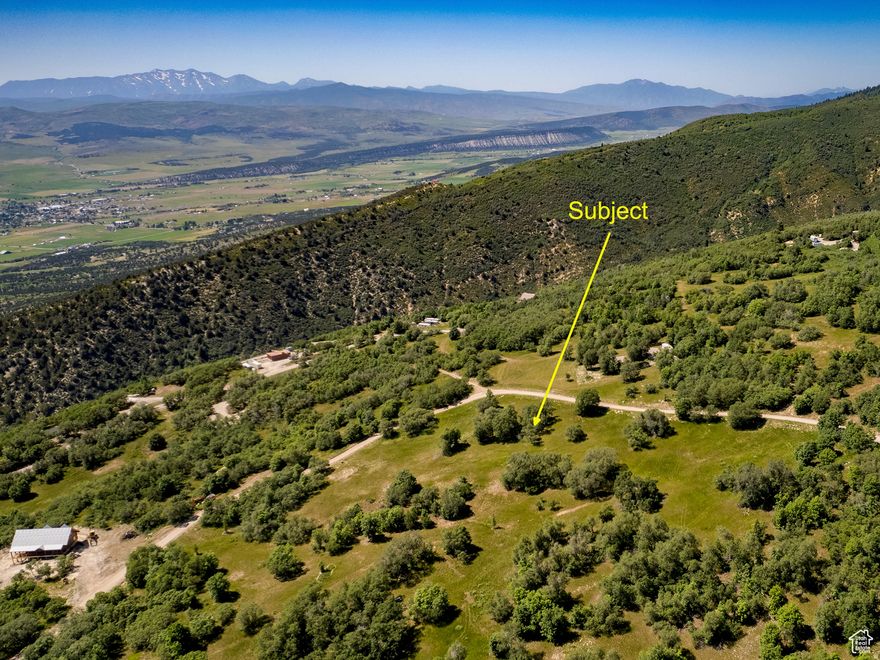 Lot #86.  CABIN PLANS available upon request. Drive the whole mountain and you'll discover for yourselves that this is one of the best lots available!  Over 3 acres with nearly flat or gently sloped terrain, this entire parcel is useable! It sits on the corner of Oak Springs and along Snow Loop.  Great shade trees lend to a park like atmosphere.  Fabulous views from every point. This gated community  has so much to offer for a small fee with golf course, swimming pool, tennis and pickle ball.  Four-wheeling and snowmobiling!