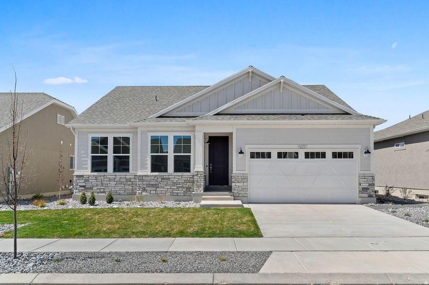 This beautiful Hobble Creek home featuring a thoughtfully designed layout and a blend of modern upgrades with timeless appeal. The kitchen is equipped with white laminate cabinetry, sleek quartz countertops, and stainless steel gas appliances-perfect for both everyday living and entertaining. A combination of laminate hardwood, tile, and plush carpet flooring provides both style and comfort throughout. Step outside to an expanded patio, ideal for relaxing or hosting gatherings. Inside, recessed can lighting and dedicated Christmas light outlets add convenience and ambiance. Energy-efficient features, including a tankless water heater, enhance comfort while helping reduce utility costs. The home is finished with elegant details such as a wood stair railing, two-tone paint, and Craftsman-style baseboards and door casings. The spacious owner's suite offers a private retreat with cultured marble shower surrounds in the bathroom and refined satin and brushed nickel hardware. This home is a well-appointed with functional upgrades and inviting living spaces all in a great master planned community!