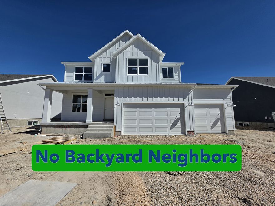 Amazing location with no backyard neighbors and incredible views of Ben Lomond. There is so much to love in this 2 story home. Love walk in Closets? 5 of the 6 bedrooms have a walk in closet. Love a big garage? Huge garage with a double deep 3 car. Love a beautiful kitchen? Custom cabinetry, oversized island and a huge pantry on this home. And to round things off there are 3 separate livings rooms, a front room/office, and the finished basement is plumbed for a future kitchenette. Front yard landscaping and some fencing included as well. This is one to see for sure!