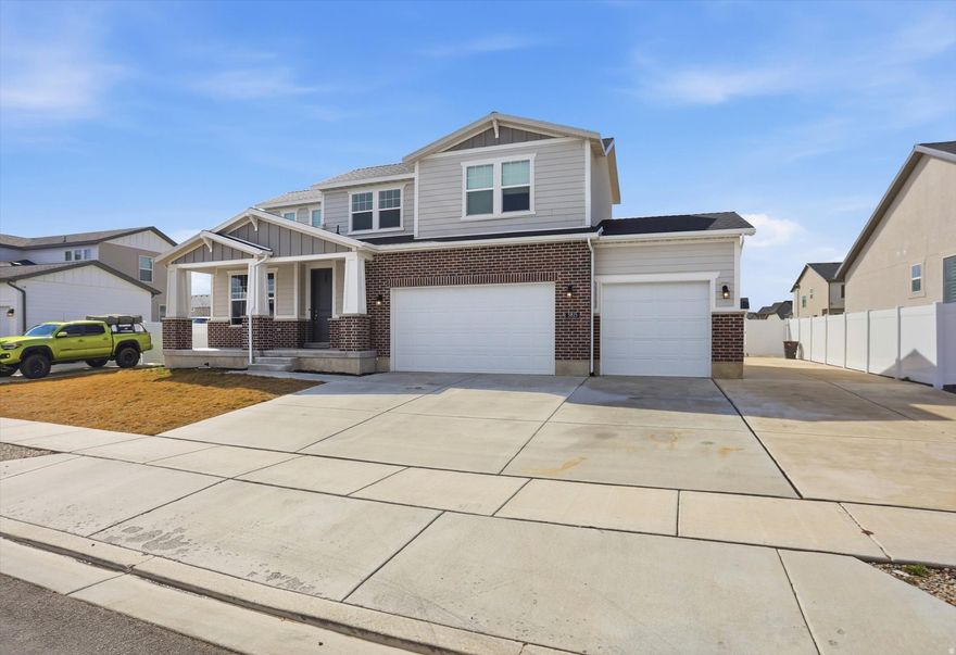 Versatile, spacious, and packed with value! This well-designed home features tall ceilings on the main level that create a bright, open feel throughout. The kitchen is finished with quartz countertops, a gas stove, and plenty of storage, opening to a comfortable living area with a cozy gas fireplace.  Need space for vehicles and toys? You'll love the RV pad, tons of additional parking, and a garage with tall ceilings for extra storage. The huge yard offers endless potential for entertaining, gardening, or creating your dream outdoor space.  The basement adds incredible flexibility with a one-bedroom, one-bath apartment featuring a separate entrance and its own laundry. Extra soundproofing was added for privacy, and the layout is thoughtfully sectioned so the primary owner still enjoys a large family room and half bath.  Location is hard to beat-just minutes from Mountain View Corridor, I-15, and Lehi Children's Hospital. Plus, a brand-new Smith's grocery store is nearly complete nearby. A perfect halfway point for commuters traveling between Salt Lake and Utah County.