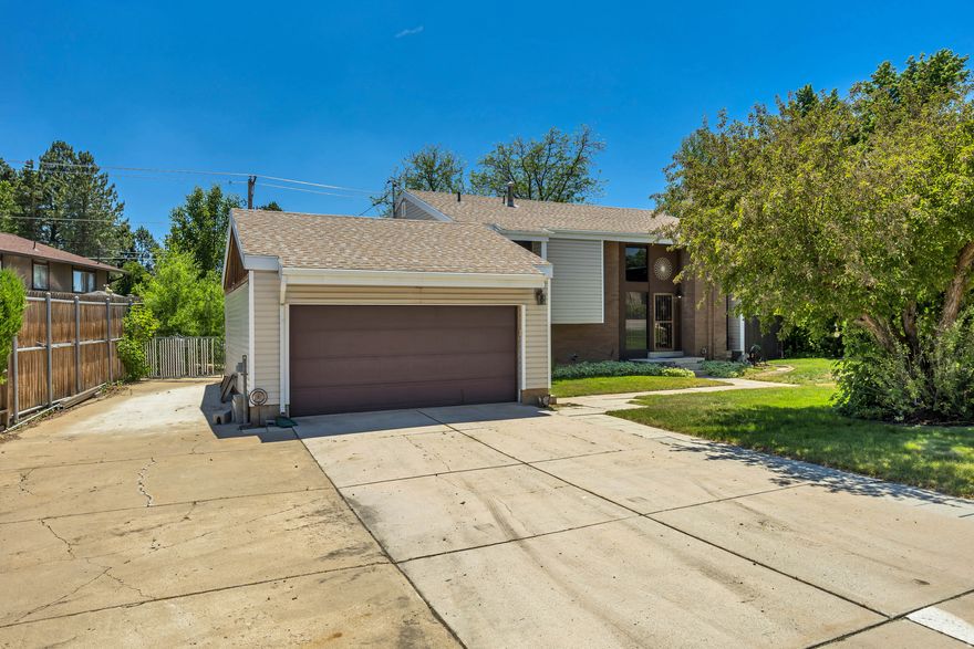 Fantastic location in a peaceful, well-established neighborhood. This home features a unique design with vaulted ceilings and a welcoming great-room entry. Plenty of options for personal touches. Outside, enjoy a fully fenced backyard with mature trees, a spacious dog run, and an oversized 335 sq. ft. storage shed-perfect for all your needs.