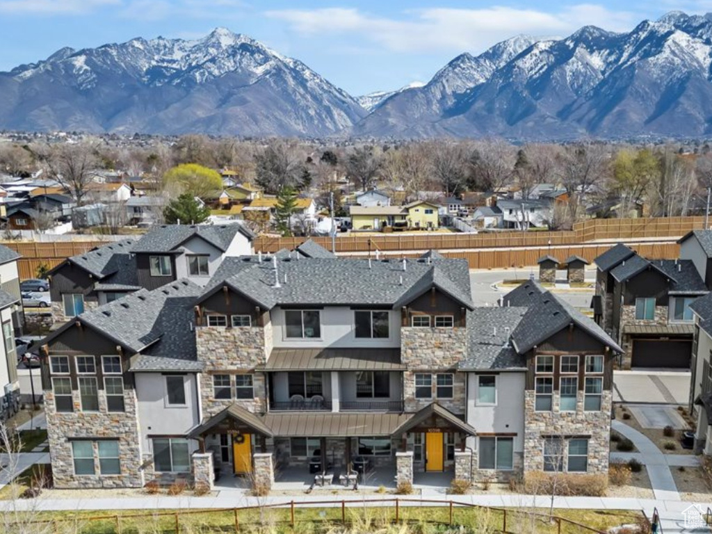 Dazzling townhome situated in award-winning Sandy location! Captivating views of the valley, sunsets and majestic mountains from every window! Magnificent, open, light-filled spaces! Grand family room perfect for gatherings and entertaining! Fabulous covered deck to soak in the stunning, never-ending views!  Sensational kitchen features quartz counters, stunning cabinetry, tile backsplash, grand island, pendant lights and gas range!  Marvelous Upgrades include beautiful laminate flooring, custom impressive closet organizers, designer window shades, and more! Lavish Primary Suite boasts breathtaking, unobstructed valley views, vaulted ceiling and walk-in closets with marvelous organizers!  Gorgeous spa-like bath includes double sinks, relaxing garden tub, european glass tile shower!  Extraordinary design showcases three luxurious private suites! This fabulous gem offers amazing  combination of lifestyle and location! Incredible, open green spaces, pool, pavilion and Porter Rockwell Trail. Minutes from world class ski resorts including Snowbird, Park City and Deer Valley.