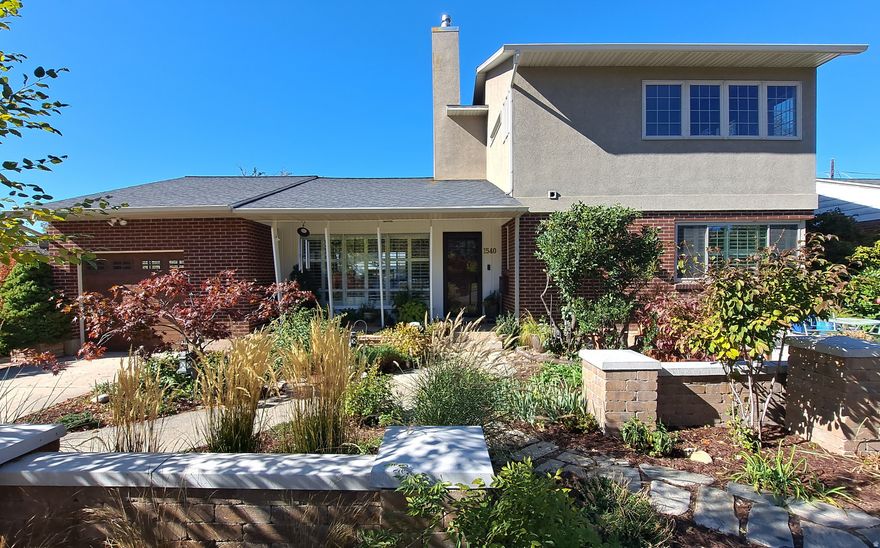 Remodeled home in Bonneville Hills with stunning views & prime location tucked away on a non-through street in the highly sought-after Bonneville Hills neighborhood, this sun-drenched 3-bedroom, three bath home blends modern elegance with timeless charm. Thoughtfully updated throughout, it features a bright, open floorplan ideal for everyday living and entertaining. Located on the City's desirable East Bench, the home offers views of the Wasatch Mountains and easy access to hiking, parks, and top-rated schools. Remodeled in 2016, the heart of the home is a gourmet kitchen featuring high-end Thermador and Bosch appliances, including a double oven with a combi steam option. A large center island and open layout make it ideal for entertaining. Sunlight pours into the spacious living areas, where a marble floor-to-ceiling gas fireplace adds a touch of luxury. Step outside to enjoy an expansive wrap-around deck perfect for gatherings, plus a covered porch for year-round relaxation. Inside, all three bathrooms are tastefully finished with tile, including a spa- inspired main suite bath with travertine tile and quartz countertops. Set in a walkable, tree-lined community with a village-like feel, you'll enjoy close proximity to the University of Utah, Bonneville Golf Course, Foothill Village, and the 15th & 15th shopping district. This is more than just a home; it's a lifestyle in one of Salt Lake's most established, family-friendly neighborhoods. World-class skiing is minutes away, with Park City, Deer Valley, and Snowbird to mention a few. Salt Lake City, home of the 2002 Winter Olympics and the upcoming 2034 Games, offers an unmatched outdoor lifestyle year-round. This is more than a home; it's a way of living in one of Salt Lake's most beloved and established communities.