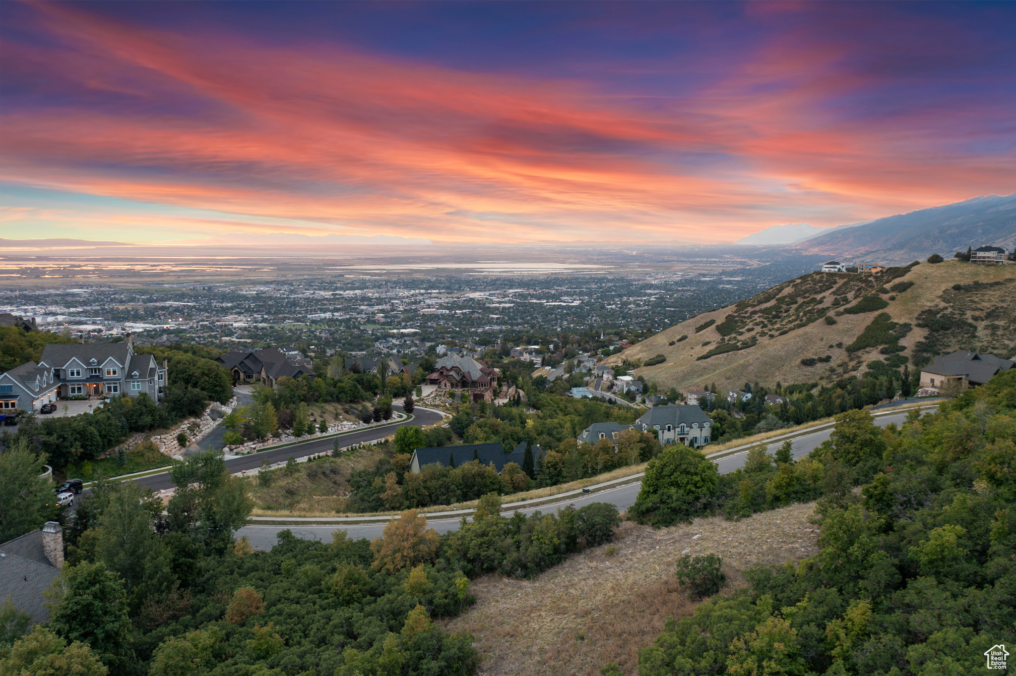 You have now found your "Dream Land." This exquisite slice of property is at the veritable highest point of Bountiful's North Valley and commands an unparalleled view of magical sunsets over the Great Salt Lake & Oquirrh Mountain range that none of the multi-million-dollar homes that dot your new neighborhood can boast. This is because all of the homes' rooflines, as you face down the valley, are beneath the sightline from even the ground floor of your future home. You're, literally, "on top of the world." This secluded, nearly 1 acre private lot provides both the privacy & serenity you value as well as easy access to shopping centers, schools & the freeway. Bring your architect & stand, together, atop this wonderful promontory & create something lasting and spectacular.