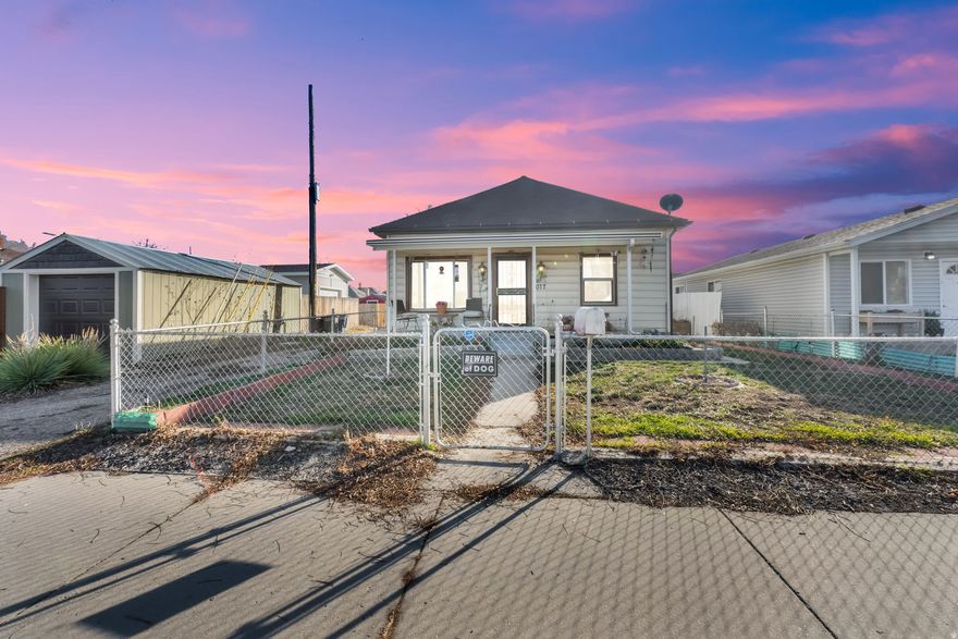 Discover a fantastic opportunity in this centrally located home full of promise and ready for your updates. A small home with tons of potential, ready for your personal touches with a few major improvements are in place with a newer roof and solar panels installed in 2019. The second bedroom has be converted into a convenient main-floor laundry room, but can easily be transformed back into a bedroom if desired.  Walk in bub. Outside, you will find a fenced yard, single car garage and shed as well as carport.  Yard perfect for pets, gardening or enjoying a little outdoor space.  Call today to view.