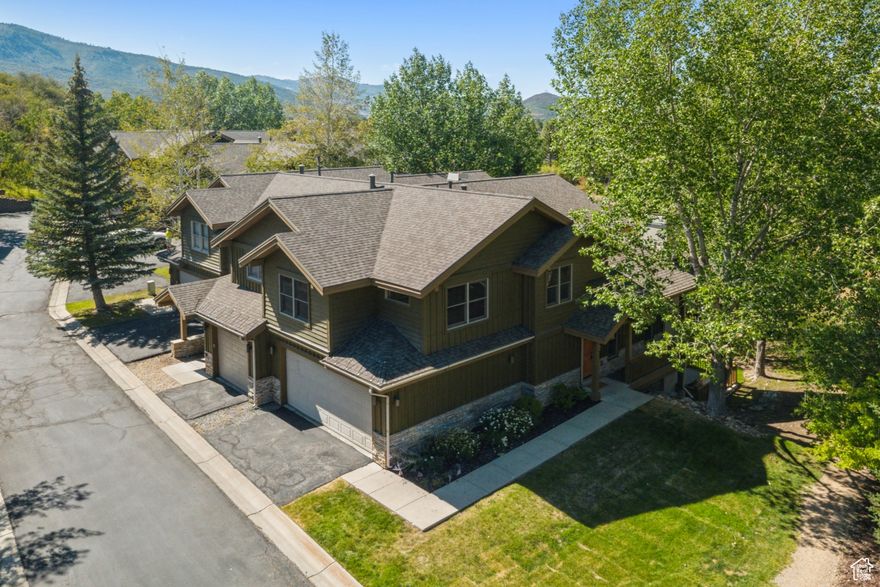 Enjoy the comfort of a single-family home with the convenience of low-maintenance living in one of Park City's most private in-town settings. This fully furnished end-unit townhome backs directly to open space and offers immediate access to the historic Rail Trail, placing endless year-round recreation right outside your door.  After a day of skiing, hiking, or biking, unwind in your private hot tub or take a short walk to the restaurants and shops of Prospector Square. Located in the highly desirable Canyon Crossing neighborhood, the property also provides quick access to Main Street, Deer Valley, and Park City Mountain.  With nightly rentals permitted, this residence is equally suited as a full-time home, vacation getaway, or income-producing investment.