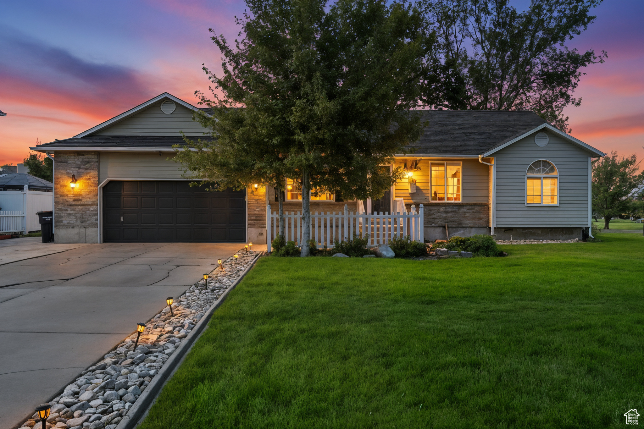 Fall in love with this Stansbury Park Rambler, with Brand new roof, newer AC, Furnace, and water heater, perfectly situated near the golf course, schools, shopping center, and lake. This amazing rambler boasts a modern farmhouse aesthetic, with meticulously thought-out paint, flooring, and decor. As you enter the home, you will be welcomed by gorgeous pine-wood flooring, while an amazing stone mantel and fireplace holds the center of the living room adjacent to the beautiful white open-concept kitchen, perfect for entertaining family and friends. Finishing touches like tile flooring, crown molding, and shiplap elegantly encapsulate every space. The luxurious main level master bedroom has a private ensuite bathroom, double sink vanity, and a separate tub and shower. On the main floor you will find two additional bedrooms and a second bathroom. Off the living room you will find French doors that welcome you to the covered outside patio, complete with year-round lighting, where you will enjoy the peace and quiet of no back yard neighbors. Downstairs boasts an additional 1600 sq ft, with one finished room, ready to be customized and finished to your desire. Schedule your showing today!