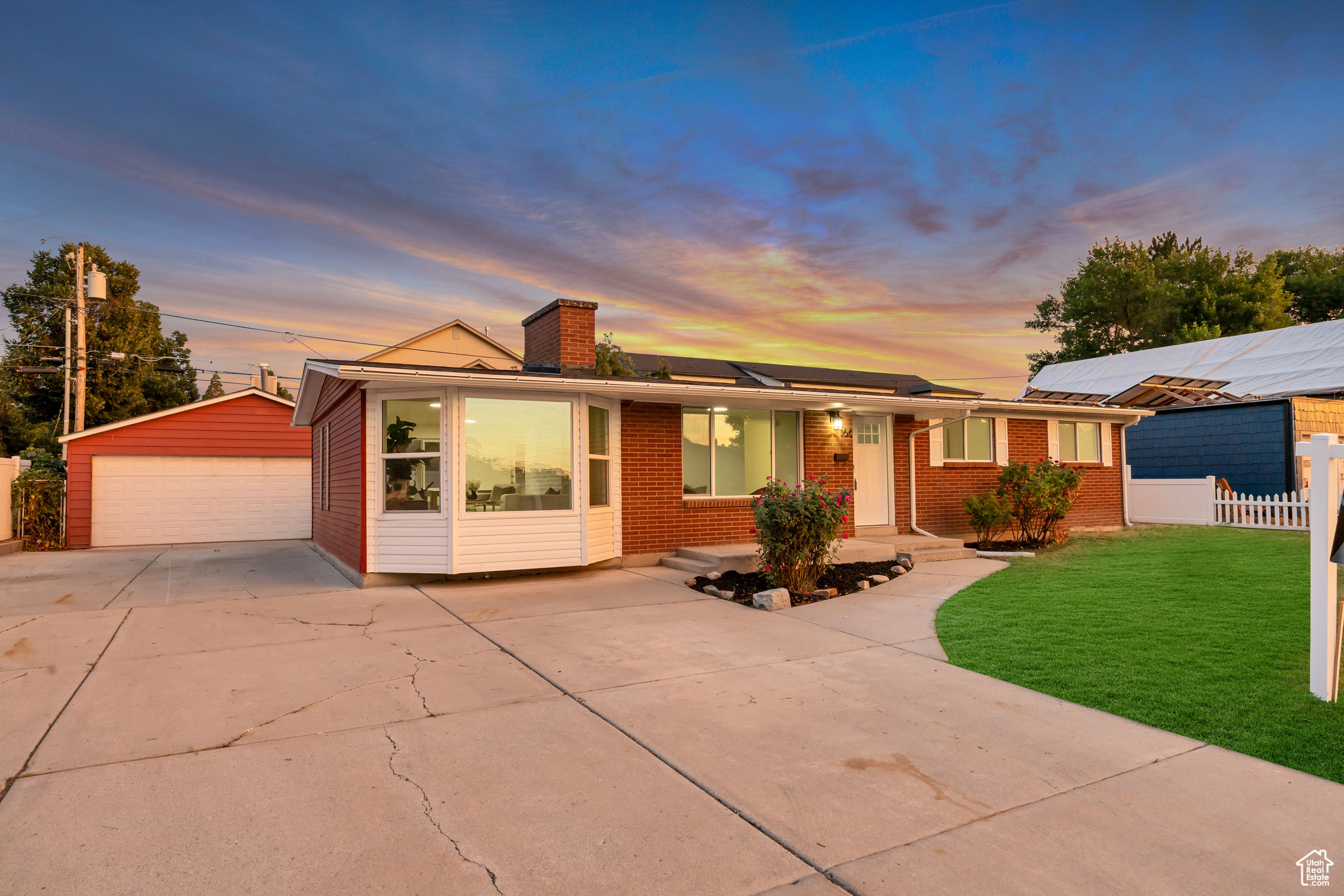 Welcome to your updated Midvale retreat, completely reimagined from top to bottom! This 5-bedroom, 2-bath beauty has undergone a transformation featuring a new roof, windows, doors, trim, paint, and drywall, and partially updated electrical and plumbing for peace of mind and years of worry-free living. Furnace and central air are less than 5 years old and water heater one year old. Step inside to an open, modern layout with designer finishes, quartz countertops, stainless-steel appliances, and luxury vinyl plank flooring that flows seamlessly throughout. Plush new carpet and stylish lighting make each room feel fresh and inviting. Enjoy three spacious bedrooms on the main level plus two additional bedrooms and a large family room downstairs perfect for guests, a home office, or game space. Outside, you'll love the oversized detached two-car garage, ideal for a workshop, home gym, or storage, along with ample RV parking and a private yard for entertaining. Centrally located near I-15, schools, shopping, and dining, this move-in-ready home offers modern upgrades, a flexible floor plan, and unbeatable value in one of the most convenient neighborhoods in the valley.