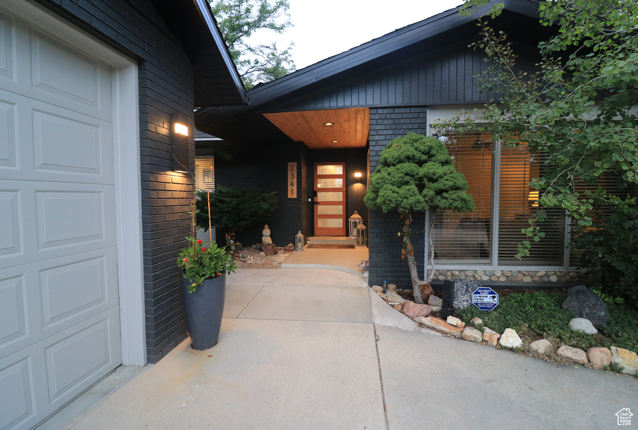 Exquisite East Millcreek Retreat! Tucked away behind mature trees, this elegantly remodeled residence blends timeless design with modern upgrades. Inside, discover premium finishes, solid core doors, and a spacious garage, along with countless high-end improvements throughout. A full mother-in-law apartment with private entrance and laundry offers versatility for extended family or rental income. Perfectly positioned near Evergreen Park, the library, and the recreation center-plus just minutes from Millcreek Canyon and world-class ski destinations. A rare opportunity in one of East Millcreek's most sought-after neighborhoods.! Aligned Showings Link Schedule a Showing. 2 PARCELS MAKE UP THIS PROPERTY 16-35-203-009 AND 16-34-203-008