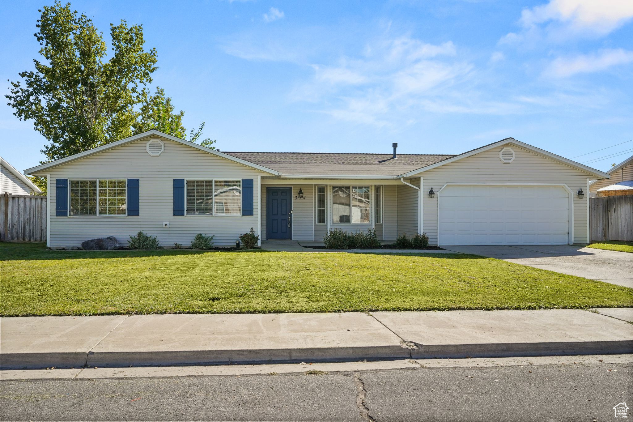 Welcome to your beautifully refreshed rambler in Provo's sought-after Lakeview area! Just steps from the Provo River Trail and minutes from Utah Lake, this 4-bed, 2-bath single-level home blends comfort, style, and location. With fresh paint throughout, brand-new carpet, updated lighting, and an inviting kitchen with granite countertops and white cabinetry, this home is truly move-in ready. The front room highlights a custom bay window with built-in seating and storage, while the full oversized laundry room provides plenty of shelf storage, extra space, and both electric and gas dryer hookups. Each of the four bedrooms offers deep closets and natural light, and the primary suite features dual closets, its own bay window, and a private bath. Outside, take in mountain views from your yard filled with mature fruit trees, berries, grapes, a playset, and large storage shed. All within walking distance to Lakeview Elementary, Provo High, and the Provo River Trail. Square footage figures are provided as a courtesy estimate only and were obtained from county records. Buyer is advised to obtain an independent measurement.