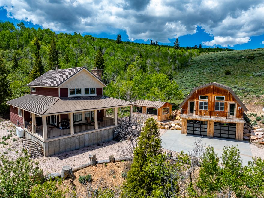 Escape to the mountains!  This beautiful home is located in the beautiful Bear Lake Valley in Garden City, UT. Situated on a 1 acre lot surrounded in Aspen trees with the most amazing views of Bear Lake!  Open concept kitchen living and eating area are great for entertaining! Relax on the covered porch or in front of the outside fireplace, listen to the Aspens as they rustle in the cool breeze or just enjoy the sunrises as they shine over the lake! Enclosed swim spa for enjoyment and relaxation year round! Large detached garage with studio apartment above.  Includes fully enclosed Can Am Commander side by side with snow trax and furniture.    Square footage figures are provided as a courtesy estimate only.  Buyer is advised to obtain an independent measurement.