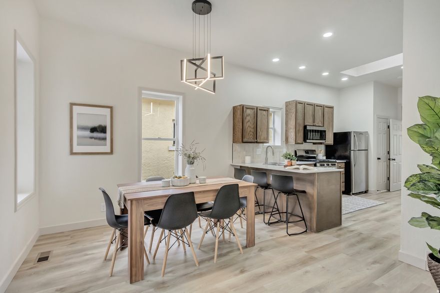 Full of character and modern updates, this beautifully refreshed 3-bedroom, 2-bathroom home offers 1,400 sq ft of inviting living space in a prime Salt Lake City location. From the moment you step inside, you'll notice the attention to detail-from brand new fixtures to the thoughtfully redesigned kitchen and living area. The updated kitchen blends style and function, perfect for both everyday living and entertaining. Upstairs, you'll find an additional bedroom with built-in shelving, adding a cozy and versatile space ideal for a home office, guest room, or creative retreat. Located in a vibrant area with easy access to everything Salt Lake has to offer, this home is a rare find that combines charm, convenience, and comfort.