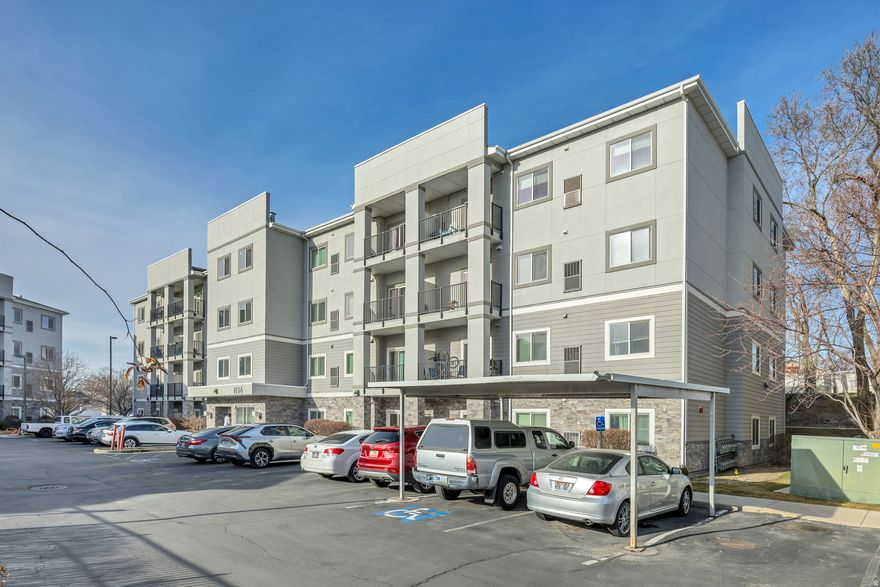 Updated and well maintained MAIN FLOOR end unit (less shared walls) condo in desired Millcreek location. New carpet and paint throughout.  One of the best floorplans offered with extra large living room space. Spacious primary suite and two full baths. Secure building and parking. HOA covers all utiliites except electricity. Swimming pool, hot tub and gym. Pets allowed, rentals allowed. Walking distance to new Millcreek Commons area, great dining and shopping, a true urban feel. Great opportunity in this growing area!