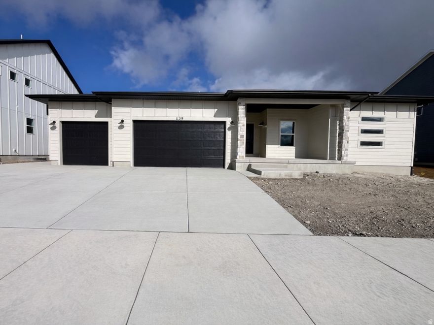 Step into this stunning 5-bedroom - 3-bathroom home in the desirable Antelope Meadows community of Eagle Mountain. The open-concept main floor flows seamlessly from a chef-ready kitchen-featuring quartz countertops, a generous island, upgraded cabinets, stainless appliances and a spacious dining area-into a bright, lofty family room. The owner's suite includes a large walk-in shower and plenty of closet space. Downstairs, a finished basement invites endless possibilities with a large recreation room, two more bedrooms, a full bath, and ample storage. Enjoy community amenities such as a pool, park and clubhouse - this home delivers quality, space and lifestyle in one complete package. Front and side yards to the back of the home will be done in the spring.