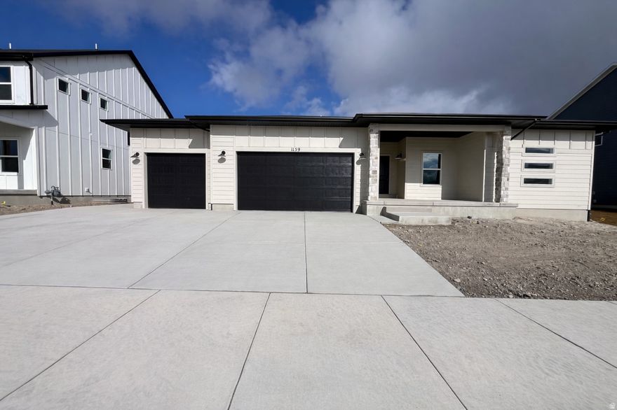 Step into this stunning 5-bedroom - 3-bathroom home in the desirable Antelope Meadows community of Eagle Mountain. The open-concept main floor flows seamlessly from a chef-ready kitchen-featuring quartz countertops, a generous island, upgraded cabinets, stainless appliances and a spacious dining area-into a bright, lofty family room. The owner's suite includes a large walk-in shower and plenty of closet space. Downstairs, a finished basement invites endless possibilities with a large recreation room, two more bedrooms, a full bath, and ample storage. Enjoy community amenities such as a pool, park and clubhouse - this home delivers quality, space and lifestyle in one complete package. Front and side yards to the back of the home will be done in the spring.