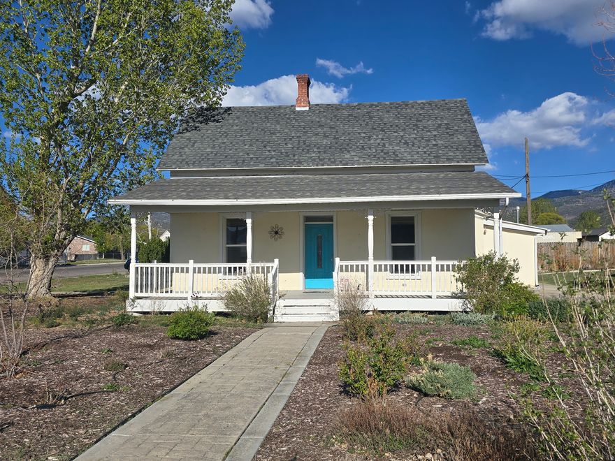 This wonderful home features updated kitchens and bathrooms, three bedrooms, and three full bathrooms. It offers a large living room, family room, and dining room, plus a detached 3-car garage that doubles as a shop. The yard includes xeriscape landscaping in front, grass in back, and a garden area.
