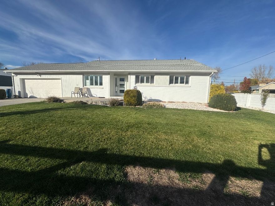 Home w/ onsite rental generating $1500 monthly. Attached & detached 2 car garages for 4 cars & storage. Fully fenced front & back yards. Roof new in 2016 & in 2022: basement remodeled, 2 new fireplaces, main kitchen remodeled & new on-demand hot water.