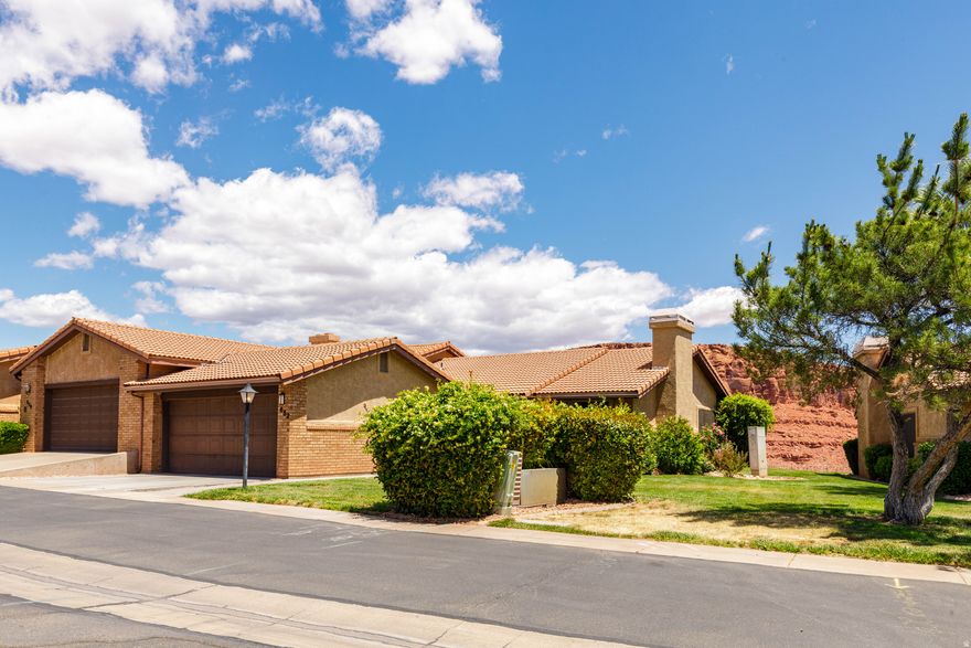 VIEWS, VIEWS & MORE VIEWS! This meticulously maintained ONE-LEVEL home sits just steps from downtown, offering the perfect blend of urban convenience and a peaceful ''up-and-out-of-the-hustle'' setting. Truly MOVE-IN READY, this gem has been REMODELED FROM TOP TO BOTTOM with updated flooring, paint, doors, hardware, water heater, new windows throughout, and a completely renovated kitchen and bathrooms. TOO MANY UPGRADES TO LIST! To top it off -- ALL APPLIANCES STAY, including the refrigerator, washer, and dryer. Step outside and enjoy NO NEIGHBORS BEHIND, giving you unobstructed access to the AMAZING VIEWS and added privacy. The NEIGHBORHOOD AMENITIES, with EASY ACCESS close by, make every day FEEL LIKE A VACATION. Featuring a clubhouse, workout room, INDOOR AND OUTDOOR POOLS FOR YEAR-ROUND ENJOYMENT, tennis courts, pickleball courts, and a small park area. Enjoy INCREDIBLE VIEWS overlooking town and the SURROUNDING RED ROCK VISTAS, all while having quick access to shopping, dining, parks, clinics, and more. For a smaller home, this one packs a HUGE PUNCH with upgrades, amenities, location, and views that are hard to beat!