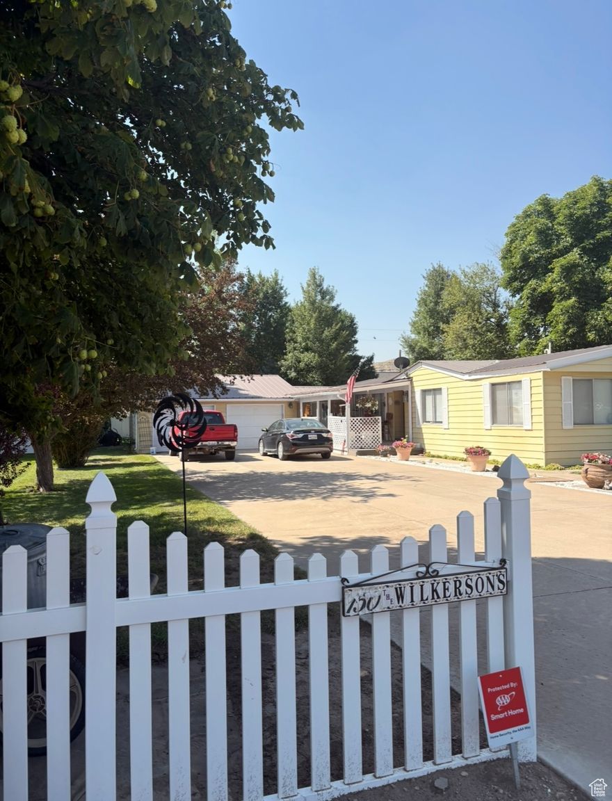 High efficiency furnace & central air. Washer & dryer are L.G., excellent units, refrigerator nearly new. Located across the street from the elementary school. Wonderful house and location for retired people, all on 1 level and a quiet location & neighborhood, and easy access to everything in town. Excellent fishing, boating, and swimming in the nearby rivers and lakes, with good hunting in the national forest nearby. The house has 3 large, covered porches to the south, west, and east. Duchesne has excellent water rights. The property has pressured irrigation. All of the irrigation water you can use only costs you $25 a year. The soil on the property is excellent and will grow anything. There is a Red Delicous apple tree, Rainier cherry tree, a large walnut tree, and a large chestnut tree. Built in large Generac back-up power system.   No renting, leasing, or owner financing will be considered on this property.