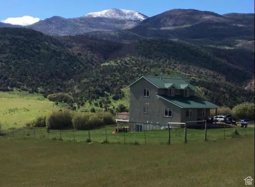 The opportunities are endless with this one. 153 acres starting at highway 89 across Thistle creek and ending in crab creek canyon. This place is a dream. Only 15 minutes from the mouth of the canyon. 6 bedroom, newly update home, two barns, a hay shed and a corral. Water shares, hay field, fishing and beaver pond. So much potential. Lease options available. Call for a showing.