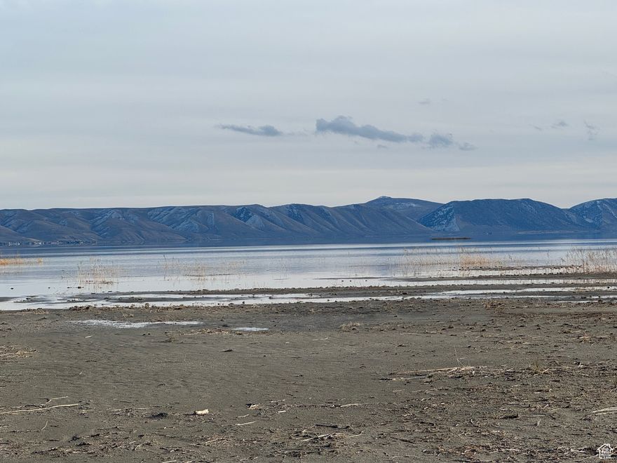 New beachfront development along North Shore of Bear Lake. North Shore Farms has 8 lots total. Private road, all utilities stubbed. 2.3 acres-2.5 acres each and over 100' of beachfront each. Launch your own water craft or use public ramp at North Beach 1 mile away. Access for ATV/UTV, snowmobiling trails close by at Green Canyon. HOA fee TBD--will cover road maintenance and sewer pond maintenance.